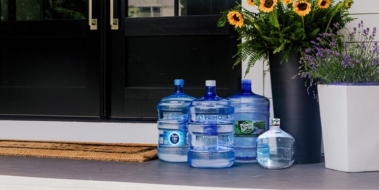 water jugs on porch