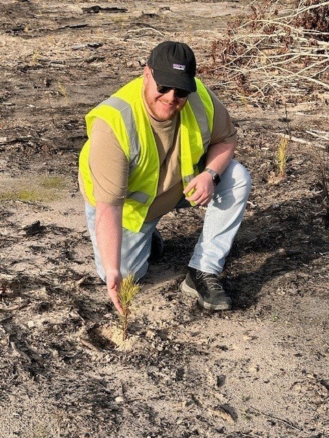 spencer sarlls planting a tree