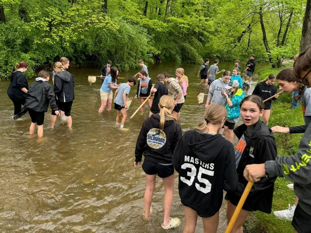 group of students in river