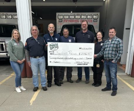 Poland Spring Group with Check photo
